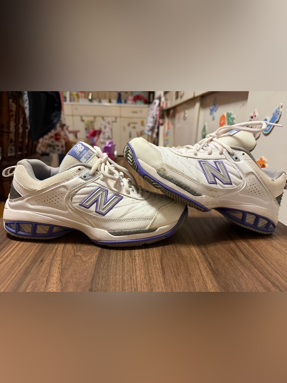New Balance Women's White Athletic Sneakers with Purple Accents